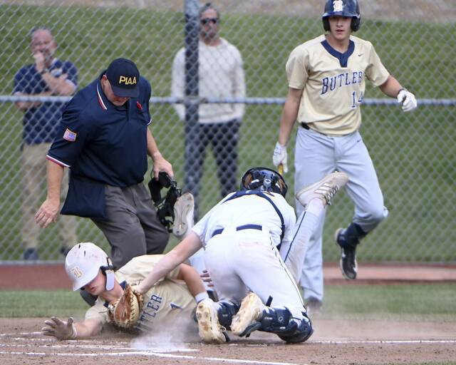 Norwin catcher Trevor Vitsas tags out Butlers Boden Lenyk at home plate during their WPIAL Class 6A quarterfinal on May 19, 2025, at North Allegheny. (Christopher Horner | TribLive)