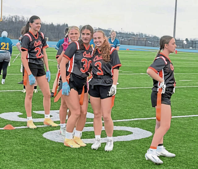 Latrobe flag football players, from left, Morgan Maiers, Emerson Shine, Maggie Maiers, Bri Havrilla and Mya Wisniewski warm up before a game earlier this season. (Submitted)