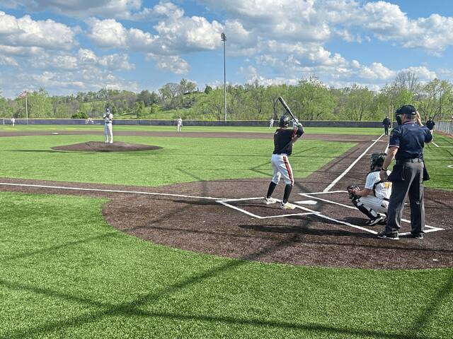 Latrobes Grady Ruffner stands in against Plum starting pitcher Brayden Kemmerer on Monday. (Sean Saputo | For TribLive)
