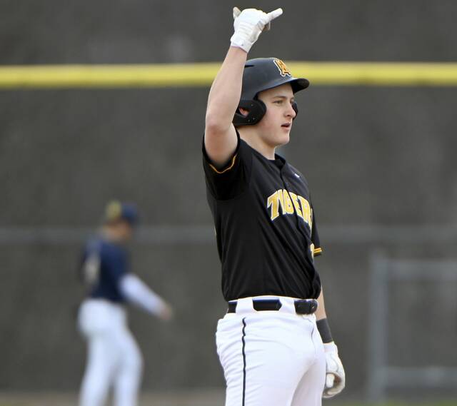 North Alleghenys Christian Simons celebrates after driving in two runs during the fourth inning against Norwin on March 25. (Christopher Horner | TribLive)