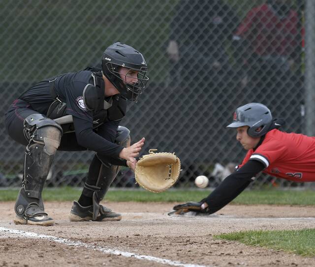 West Alleghenys Danny Sorensen scores past Beaver catcher Aidan Skalko on Wednesday at Hardy Field in Brighton. (Christopher Horner | TribLive)
