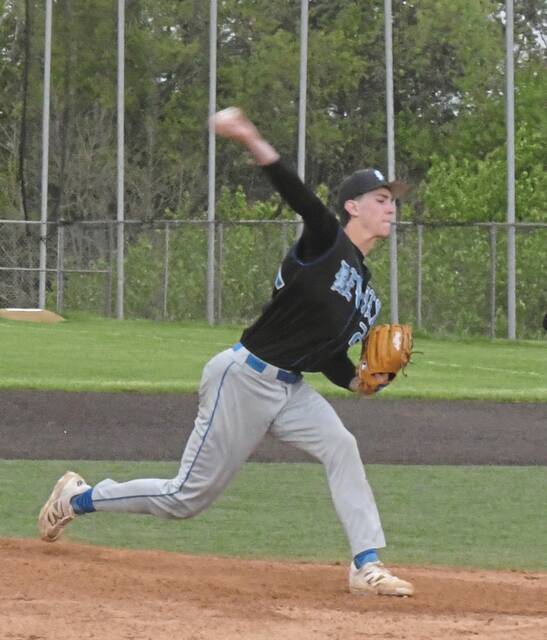Mt. Lebanon junior Graham Keen throws against Norwin on April 30. (Paul Schofield | TribLive)