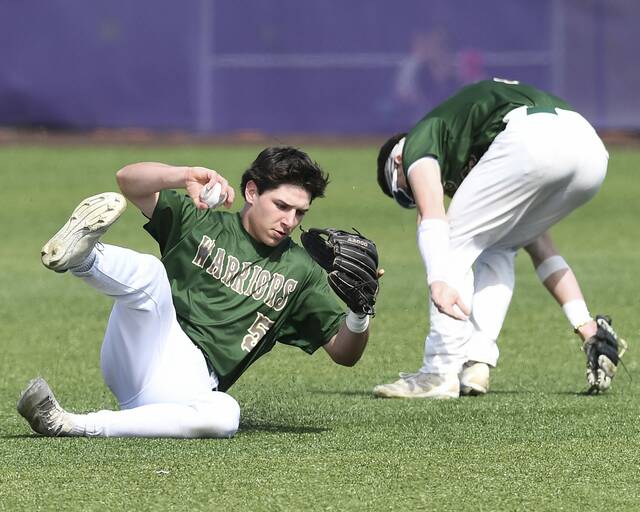 Penn-Trafford’s Logan Matrisch makes a sliding catch in the outfield against Fox Chapel during their WPIAL Class 5A first round playoff game on Tuesday, May 12, 2026, at Plum. (Christopher Horner | TribLive)