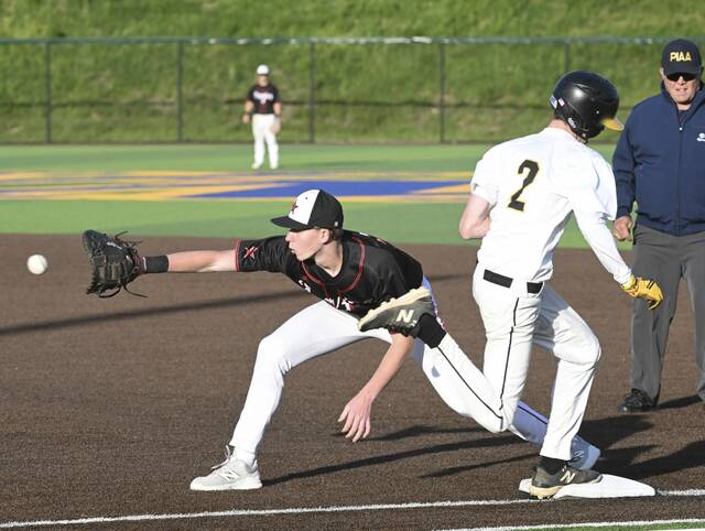 Riverviews Liam Tomlinson beats the throw against Fraziers Nick Porter during WPIAL first-round playoff action May 11, 2026, at West Mifflin High School. (Chaz Palla | TribLive)