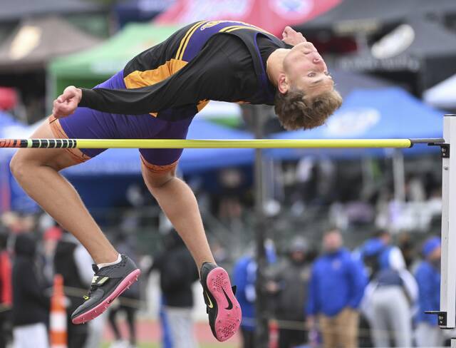Plums Owen Proskin takes second in the high jump during the WPIAL Class 3A Track and Field Championships on Thursday at Slippery Rock University. (Chaz Palla | TribLive)
