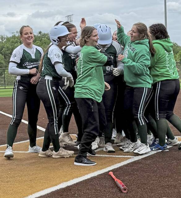 Teammates celebrate with Riversides Saeryn Hoover after she homered against Brentwood in a WPIAL Class 2A first-round game Thursday. (Submitted)