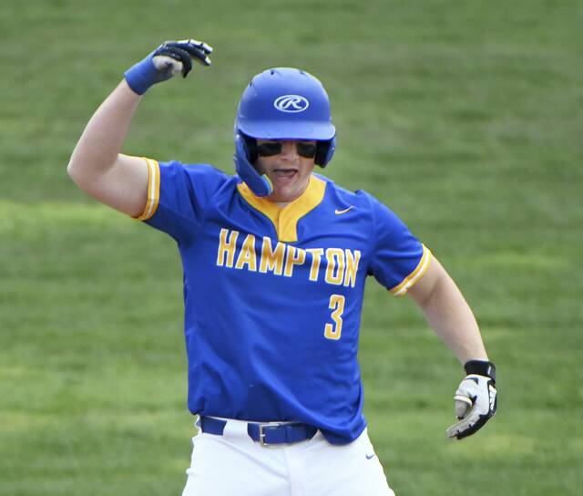 Hamptons Brody Junker celebrates his double against Beaver on March 30 at Hardy Field in Brighton. (Christopher Horner | TribLive)