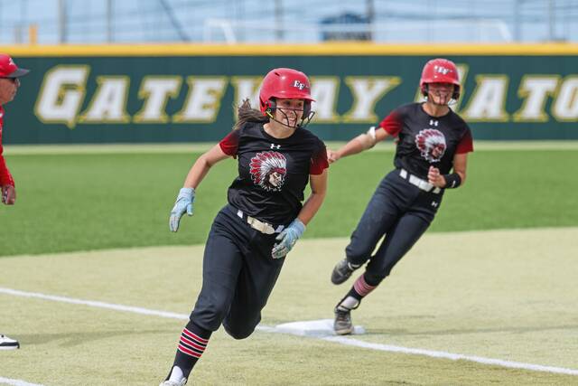 Elizabeth Forward's Claire Balint (30), left, and Berlyn Holibaugh (3) race home after rounding third base during a WPIAL Class 4A semifinal Thursday, May 21, 2026. (Jeff Helsel | Mon Valley Independent)