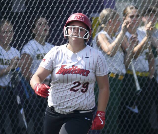 North Hills Emma Culver rounds the bases past the Penn-Trafford dugout after hitting a home run during their WPIAL Class 5A quarterfinal Tuesday at Plum. (Christopher Horner | TribLive)
