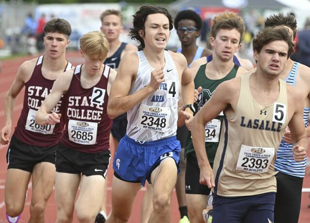 Hempfields Jonathan Stetchock finishes second in the 1,600-meter run during the PIAA Class 3A track and field championships Friday at Shippensburg University. (Chaz Palla | TribLive)