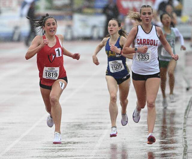 Peters Townships Kathryn Froelich wins the 3,200-meter run during the PIAA Class 3A Track and Field Championships on Saturday at Shippensburg University. (Chaz Palla | TribLive)