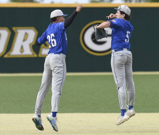South Parks Robert Lenzi (26) and Johnny Parris celebrate after defeating Avonworth in their WPIAL Class 3A semifinal Thursday at Gateway. (Christopher Horner | TribLive)