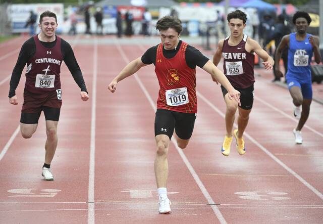 North Catholics Logan Schade edges last years winner, Greensburg Central Catholics Jerry Davis, to win the 400-meter dash during the PIAA Class 2A Track and Field Championships on Saturday at Shippensburg University. (Chaz Palla | TribLive)