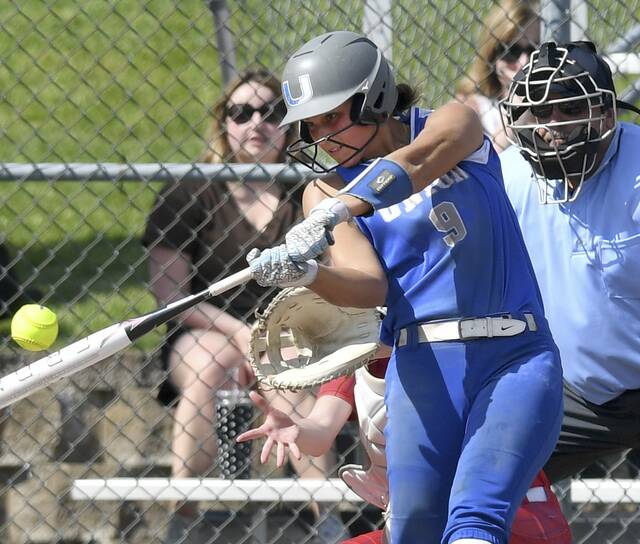Unions Irelyn Fisher hits a grand slam against Jeannette during their WPIAL Class A quarterfinal May 18. (Christopher Horner | TribLive)