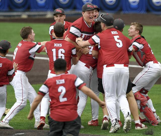 The Neshannock baseball team celebrates after defeating Fort Cherry in the WPIAL Class 2A championship game on Tuesday, May 26, 2026, at EQT Park. (Christopher Horner | TribLive)