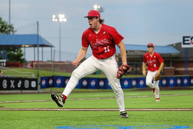 Indiana pitcher Charlie Manzi (11) reacts after recording the final out of the fifth inning during the WPIAL Class 4A championship game against Elizabeth Forward on Tuesday May 26, 2026 at EQT Park in Washington. (Jeff Helsel | Mon Valley Independent)