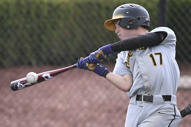 Riverviews Ian Stempfer hits an RBI single against South Side during the WPIAL Class 2A third-place game Tuesday at Ross Memorial Park. (Chaz Palla | TribLive)