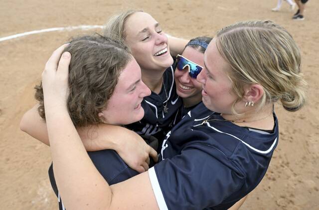 Shalers Alyssa Schaffold, Bria Bosiljevac, Haley Machajewski and Taylor London celebrate after beating North Hills in the WPIAL Class 5A softball championship game Wednesday at Lilley Field. (Chaz Palla | TribLive)