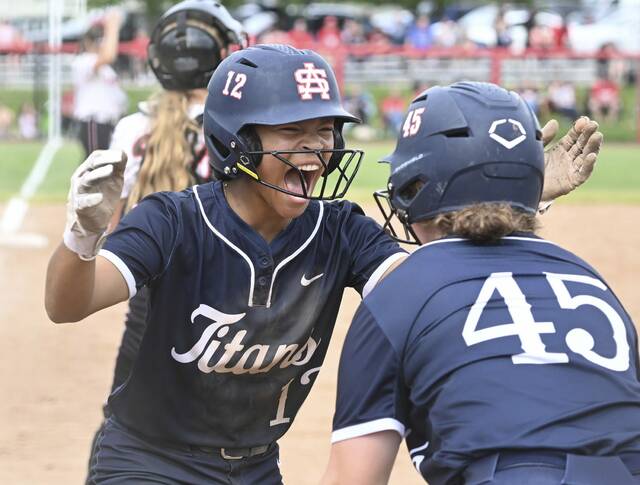 Shalers Jayla Antomachi celebrates with Alyssa Schaffold after scoring against North Hills during the WPIAL Class 5A softball championship May 27, 2026 at Lilley Field. (Chaz Palla | TribLive)