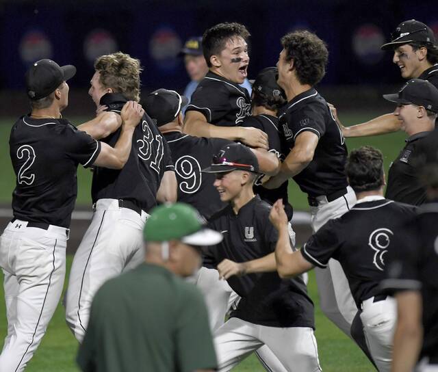 The Upper St. Clair baseball team celebrates after defeating South Fayette in the WPIAL Class 5A championship game on Wednesday, May 27, 2026, at EQT Park. (Christopher Horner | TribLive)