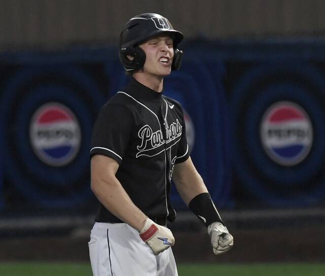 Upper St. Clair’s Tanner Schroeck celebrates after driving in the go-ahead run against South Fayette during the WPIAL Class 5A championship game on Wednesday, May 27, 2026, at EQT Park. (Christopher Horner | TribLive)